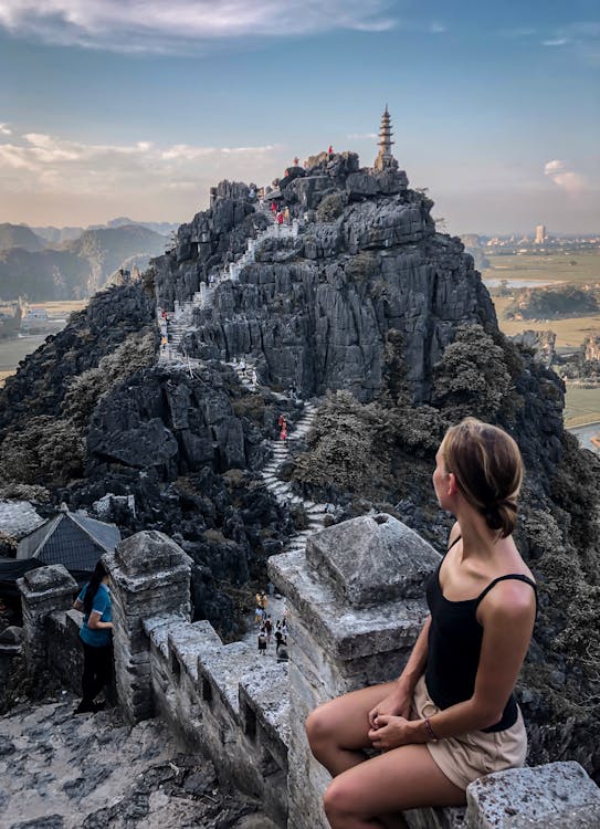 Tourists visit Mua Cave