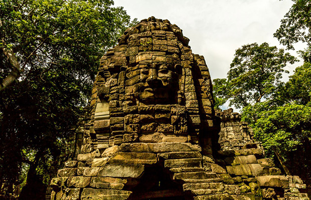 Enigmatic smiling faces in Banteay Chhmar