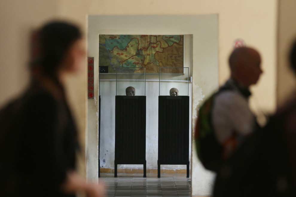 Tourists visit the Tuol Sleng Genocide Museum