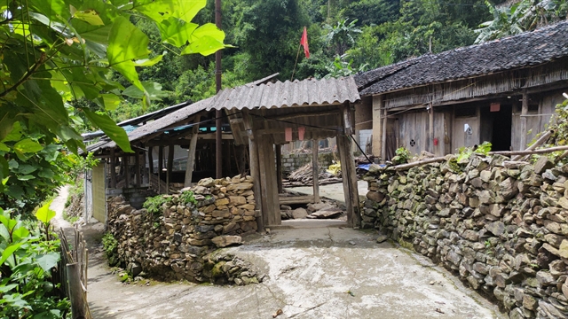 Stone gates and walls are typical materials in Thiên Hương Village. — Photo vienkientrucquocgia.gov.vn